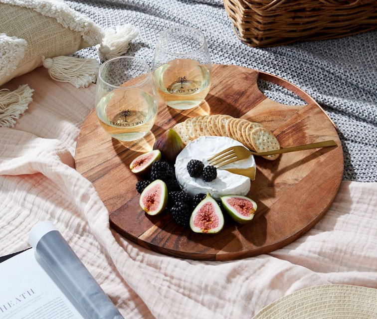 white wine with cheese and fig platter