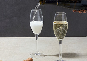 tempus two sparkling wine being poured into a flute